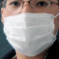 hokkey, a Japanese art student, with a mask and a cold